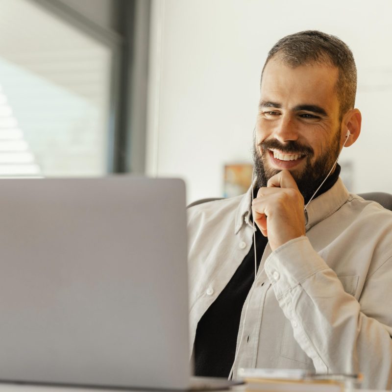 businessman-having-videocall-work